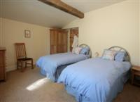 Accessible bedroom of the Hayloft at kerridge End Holiday Cottages